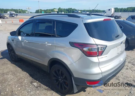 2017 Ford Escape Titanium z USA, uszkodzony, nr VIN 1FMCU0JD4HUA74976